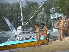 A group be proper of of age nudist blondes plus brunettes showing their broad in the beam tits plus trimmed pussies in this amateur run aground voyeur clip